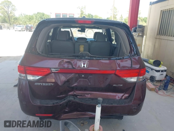 2014 Honda Odyssey Touring with VIN 5FNRL5H90EB080889, listed as a IAAI auction lot 42085305 with 123,286 mi miles and . Bid and sale history available at carsss.com. Image 16.