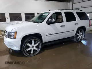 2013 Chevrolet Tahoe LTZ with VIN 1GNSKCE06DR326794, listed as a Copart auction lot 55042295 with 177,577 mi miles and Salvage title. Bid and sale history available at DreamBid. Image 1.