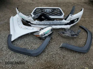 2018 Toyota Tacoma SR z VIN 3TMCZ5AN5JM181489, wystawiony jako Copart lot #55696365 z przebiegiem 70 091 mil mil oraz Szkoda całkowita • Salvage title. Historia ofert i sprzedaży dostępna na DreamBid. Obrazek 12.