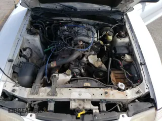 1996 Ford Mustang with VIN 1FALP4041TF206244, listed as a Copart auction lot 56311934 with 123,572 mi miles and Salvage Title. Bid and sale history available at carsss.com. Image 11.