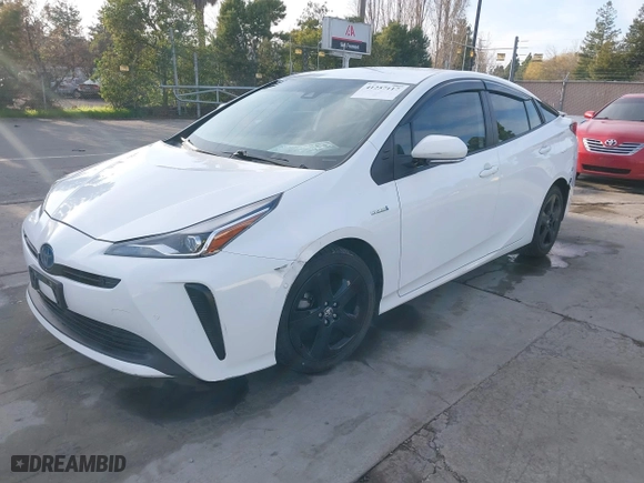 2021 Toyota Prius L Eco with VIN JTDKAMFU9M3131228, listed as a IAAI auction lot 41257117 with 72,840 mi miles. Bid and sale history available at carsss.com. Image 18.
