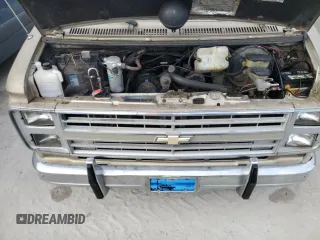 1989 Chevrolet Chevy Van z VIN 1GBEG25K2K7120100, wystawiony jako Copart lot #75508934 z przebiegiem Nie podano mil oraz Szkody całkowita. Historia ofert i sprzedaży dostępna na DreamBid. Obrazek 12.