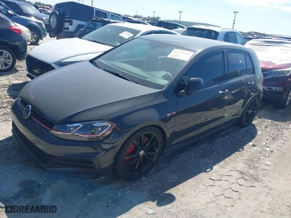 2019 Volkswagen Golf GTI S with VIN 3VW6T7AU0KM005773, listed as a IAAI auction lot 41269980 with 75,534 mi miles. Bid and sale history available at carsss.com. Image 2.