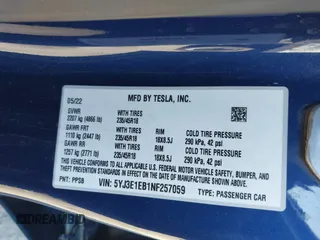 2022 Tesla Model 3 Long Range with VIN 5YJ3E1EB1NF257059, listed as a IAAI auction lot 41329318 with 30,652 mi miles and . Bid and sale history available at DreamBid. Image 9.