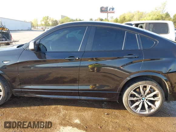 2016 BMW X4 M40i z VIN 5UXXW7C59G0M91223, wystawiony jako IAAI lot #42009394 z przebiegiem 144 771 mil mil oraz . Historia ofert i sprzedaży dostępna na DreamBid. Obrazek 14.