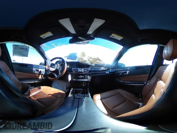 2014 Mercedes-Benz E 550 Sport with VIN WDDHF9BB5EA923294, listed as a IAAI auction lot 41588318 with 141,510 mi miles and . Bid and sale history available at DreamBid. Image 24.