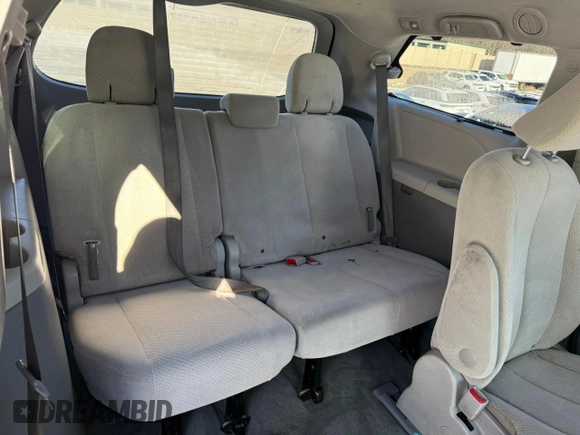 2014 Toyota Sienna LE with VIN 5TDJK3DC4ES074014, listed as a Copart auction lot 48602075 with 284,647 mi miles and Clean Title. Bid and sale history available at DreamBid. Image 6.