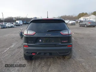 2022 Jeep Cherokee Trailhawk with VIN 1C4PJMBX0ND548397, listed as a IAAI auction lot 41240303 with 54,055 mi miles. Bid and sale history available at carsss.com. Image 16.