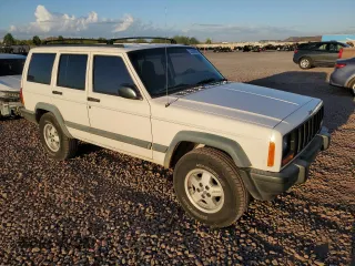 1997 Jeep Cherokee Sport z VIN 1J4FJ68S9VL594832, wystawiony jako Copart lot #53081675 z przebiegiem 167 028 mil mil oraz Czysty tytuł • Clean title. Historia ofert i sprzedaży dostępna na DreamBid. Obrazek 4.