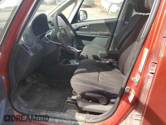 2012 Suzuki SX4 Crossover with VIN JS2YB5A34C6308024, listed as a Copart auction lot 71259074 with 171,165 mi miles and Salvage Title. Bid and sale history available at carsss.com. Image 7.