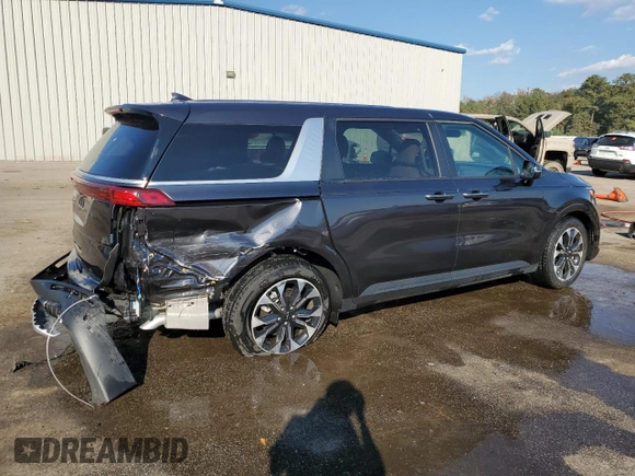 2024 Kia Carnival EX with VIN KNDNC5H3XR6450371, listed as a Copart auction lot 77849594 with 2,003 mi miles and Salvage Title. Bid and sale history available at carsss.com. Image 3.