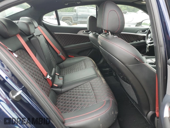 2023 Genesis G70 3.3T with VIN KMTG54TE7PU113169, listed as a Copart auction lot 71008994 with 17,864 mi miles and Salvage Title. Bid and sale history available at DreamBid. Image 10.