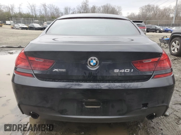 2015 BMW 6 Series 640i xDrive z VIN WBA6B8C5XFD453762, wystawiony jako Copart lot #44228965 z przebiegiem 105 188 mil mil oraz Szkoda całkowita • Salvage title. Historia ofert i sprzedaży dostępna na DreamBid. Obrazek 6.