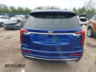 2023 Cadillac XT6 AWD Premium Luxury with VIN 1GYKPDRS2PZ126666, listed as a IAAI auction lot 40963833 with 23,535 mi miles and . Bid and sale history available at DreamBid. Image 17.