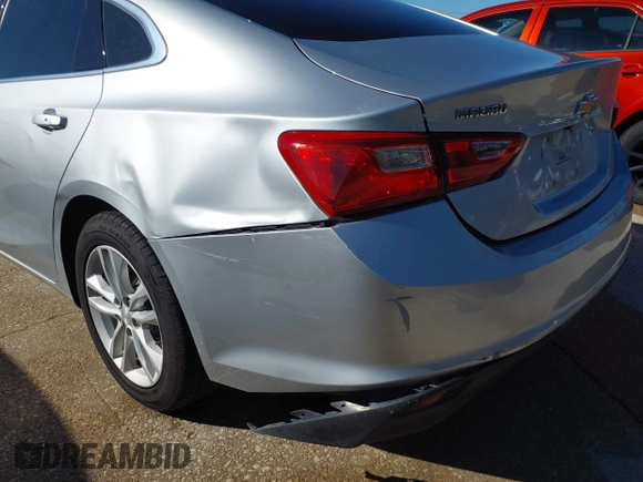 2018 Chevrolet Malibu LT z VIN 1G1ZD5ST4JF244922, wystawiony jako IAAI lot #42218808 z przebiegiem 119 042 mil mil oraz . Historia ofert i sprzedaży dostępna na DreamBid. Obrazek 6.