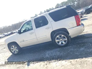 2012 GMC Yukon SLT with VIN 1GKS1CE0XCR230343, listed as a Copart auction lot 45498515 with 229,224 mi miles and Salvage Title. Bid and sale history available at carsss.com. Image 2.