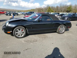 2003 Ford Thunderbird Deluxe z VIN 1FAHP60A63Y104093, wystawiony jako Copart lot #76028744 z przebiegiem 79 995 mil mil oraz Szkoda całkowita • Salvage title. Historia ofert i sprzedaży dostępna na DreamBid. Obrazek 1.
