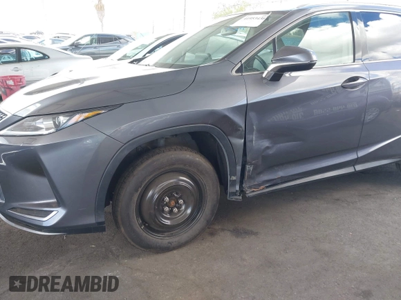 2022 Lexus RX 350 with VIN 2T2HZMAA1NC225639, listed as a IAAI auction lot 41953438 with 48,493 mi miles and . Bid and sale history available at DreamBid. Image 6.