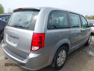2016 Dodge Grand Caravan SE with VIN 2C4RDGBG5GR251689, listed as a IAAI auction lot 42149865 with 137,410 mi miles and . Bid and sale history available at DreamBid. Image 4.