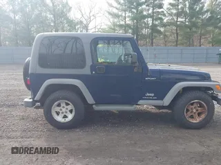 2005 Jeep Wrangler Sport with VIN 1J4FA49S25P302627, listed as a IAAI auction lot 42100601 with 169,650 mi miles. Bid and sale history available at carsss.com. Image 13.