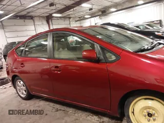 2005 Toyota Prius with VIN JTDKB20U957052808, listed as a IAAI auction lot 42000309 with 233,979 mi miles and . Bid and sale history available at DreamBid. Image 14.