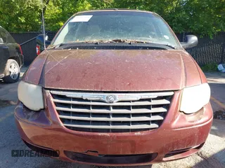 2007 Chrysler Town & Country Touring z VIN 2A4GP54L97R152073, wystawiony jako IAAI lot #42322594 z przebiegiem 152 292 mil mil oraz . Historia ofert i sprzedaży dostępna na DreamBid. Obrazek 6.