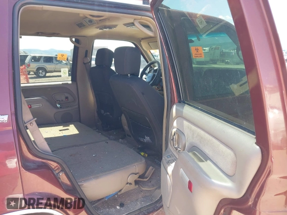 1999 Chevrolet Tahoe Z71 with VIN 1GNEK13R4XJ341736, listed as a IAAI auction lot 42218712 with 282,663 mi miles and . Bid and sale history available at DreamBid. Image 8.