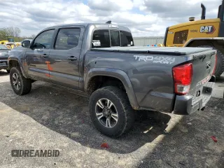 2016 Toyota Tacoma SR with VIN 3TMCZ5AN0GM032190, listed as a Copart auction lot 55405335 with 158,645 mi miles and Clean Title. Bid and sale history available at DreamBid. Image 2.