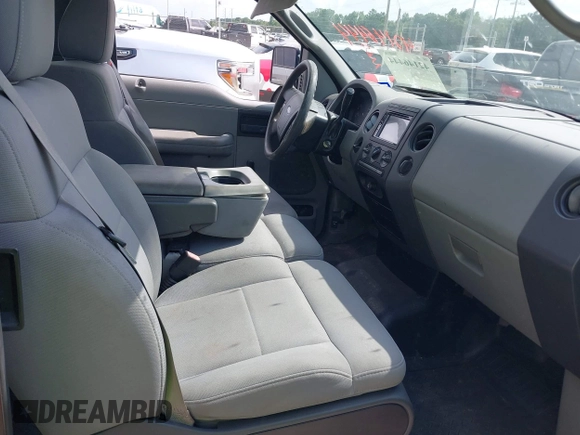 2006 Ford F-150 STX with VIN 1FTRX12W16NA06606, listed as a IAAI auction lot 42146444 with 164,185 mi miles and . Bid and sale history available at DreamBid. Image 5.