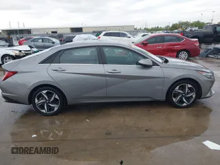 2021 Hyundai Elantra SEL z VIN KMHLN4AG7MU146908, wystawiony jako IAAI lot #41896524 z przebiegiem 37 444 mil mil oraz . Historia ofert i sprzedaży dostępna na DreamBid. Obrazek 13.
