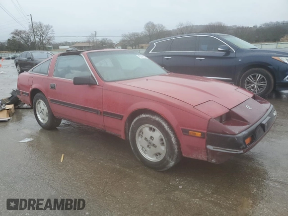 1985 Nissan 300ZX z VIN JN1HZ14S2FX092175, wystawiony jako Copart lot #45348155 z przebiegiem 162 305 mil mil oraz Czysty tytuł • Clean title. Historia ofert i sprzedaży dostępna na DreamBid. Obrazek 4.