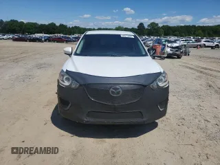 2013 Mazda CX-5 Sport with VIN JM3KE2BE4D0109296, listed as a Copart auction lot 55575555 with 130,112 mi miles and Salvage title. Bid and sale history available at DreamBid. Image 5.