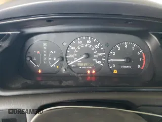 2001 Toyota Camry CE z VIN JT2BG22K010543907, wystawiony jako Copart lot #60874815 z przebiegiem 313 008 mil mil oraz Czysty tytuł • Clean title. Historia ofert i sprzedaży dostępna na DreamBid. Obrazek 9.
