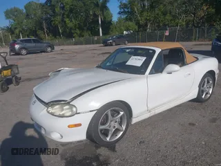 2003 Mazda MX-5 Miata Cloth z VIN JM1NB353730312566, wystawiony jako IAAI lot #41782864 z przebiegiem Nie podano mil oraz . Historia ofert i sprzedaży dostępna na DreamBid. Obrazek 18.