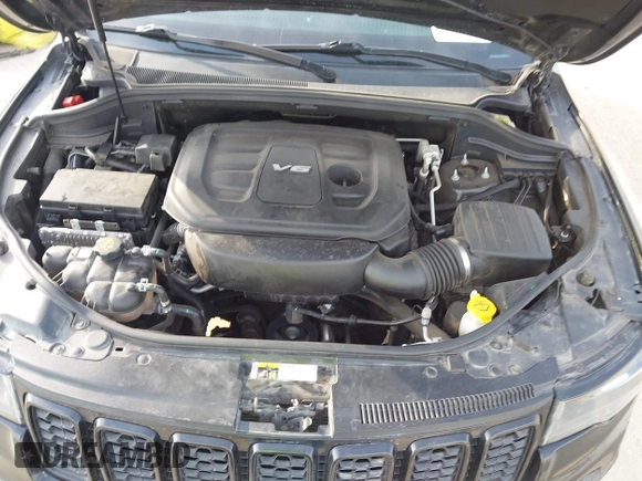 2018 Jeep Grand Cherokee Altitude with VIN 1C4RJFAG9JC436848, listed as a IAAI auction lot 42303459 with 124,044 mi miles and . Bid and sale history available at DreamBid. Image 10.