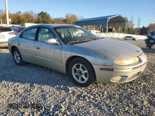 2001 Oldsmobile Aurora z VIN 1G3GR64H514125528, wystawiony jako Copart lot #81910664 z przebiegiem 117 926 mil mil oraz Tytuł czysty. Historia ofert i sprzedaży dostępna na DreamBid. Obrazek 4.