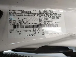 2013 Ford Focus S with VIN 1FADP3E27DL200618, listed as a IAAI auction lot 42028086 with 131,438 mi miles. Bid and sale history available at carsss.com. Image 9.