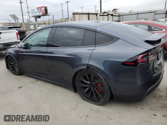 2023 Tesla Model X Plaid with VIN 7SAXCBE62PF405922, listed as a Copart auction lot 53826915 with 1,358 mi miles and Salvage Title. Bid and sale history available at DreamBid. Image 2.