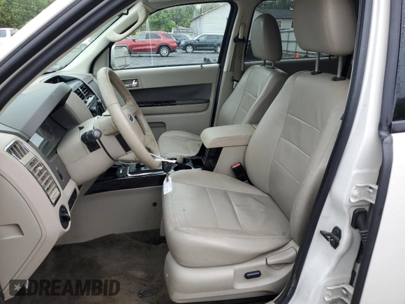 2010 Ford Escape Hybrid with VIN 1FMCU4K35AKB43740, listed as a Copart auction lot 58714855 with 116,463 mi miles and Salvage title. Bid and sale history available at DreamBid. Image 7.