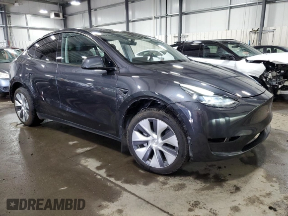 2024 Tesla Model Y Long Range with VIN 7SAYGDEE6RA253946, listed as a Copart auction lot 46699445 with 6,008 mi miles and Salvage Title. Bid and sale history available at DreamBid. Image 4.