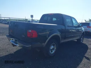 2003 Ford F-150 XLT with VIN 1FTRW08L63KC51053, listed as a IAAI auction lot 42538965 with 167,383 mi miles and . Bid and sale history available at DreamBid. Image 4.
