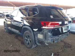 2018 Volkswagen Atlas SE with VIN 1V2CP2CA1JC600999, listed as a IAAI auction lot 42339421 with 133,490 mi miles and . Bid and sale history available at DreamBid. Image 3.