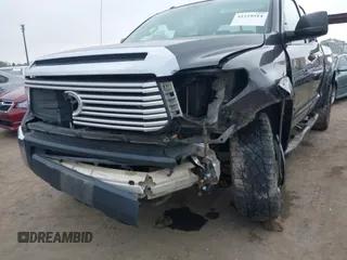 2014 Toyota Tundra SR with VIN 5TFUM5F16EX052444, listed as a IAAI auction lot 42298372 with 121,876 mi miles and . Bid and sale history available at DreamBid. Image 6.