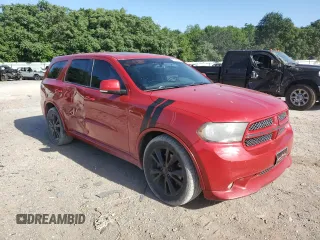 2012 Dodge Durango R/T with VIN 1C4SDHCT8CC260151, listed as a Copart auction lot 61675644 with 151,467 mi miles and Salvage title. Bid and sale history available at DreamBid. Image 4.