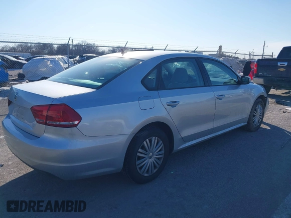 2014 Volkswagen Passat S w/Nav with VIN 1VWAP7A35EC052552, listed as a IAAI auction lot 41377109 with 123,273 mi miles. Bid and sale history available at carsss.com. Image 4.