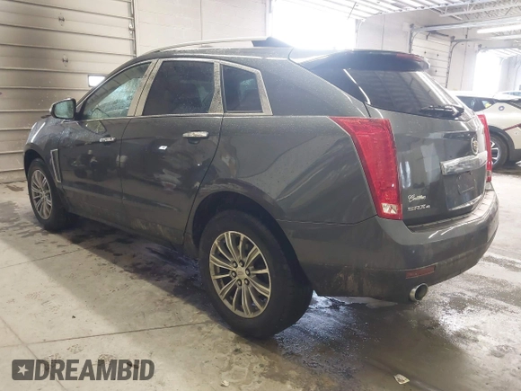 2013 Cadillac SRX Performance Collection with VIN 3GYFNHE37DS530908, listed as a IAAI auction lot 41662796 with 80,254 mi miles. Bid and sale history available at carsss.com. Image 3.