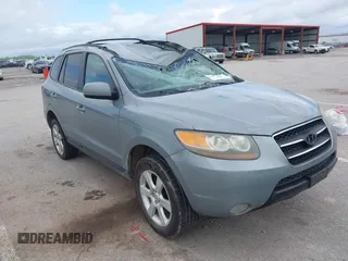 2007 Hyundai Santa Fe SE z VIN 5NMSH13E67H067243, wystawiony jako IAAI lot #42130686 z przebiegiem 155 724 mil mil oraz . Historia ofert i sprzedaży dostępna na DreamBid. Obrazek 1.