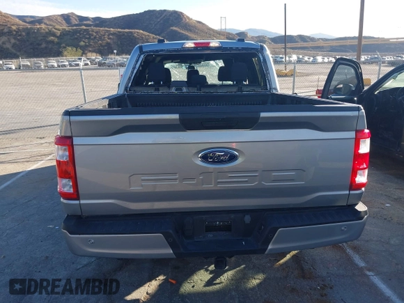 2023 Ford F-150 XL with VIN 1FTFW1E55PKD57059, listed as a IAAI auction lot 41625898 with 49,882 mi miles. Bid and sale history available at carsss.com. Image 16.