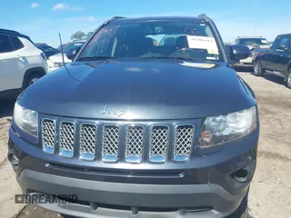 2015 Jeep Compass Latitude with VIN 1C4NJCEBXFD179373, listed as a IAAI auction lot 39380614 with 104,832 mi miles. Bid and sale history available at carsss.com. Image 13.