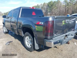 2011 GMC Sierra 1500 SLE with VIN 3GTP1VE06BG207203, listed as a IAAI auction lot 41495972 with 151,239 mi miles. Bid and sale history available at carsss.com. Image 3.